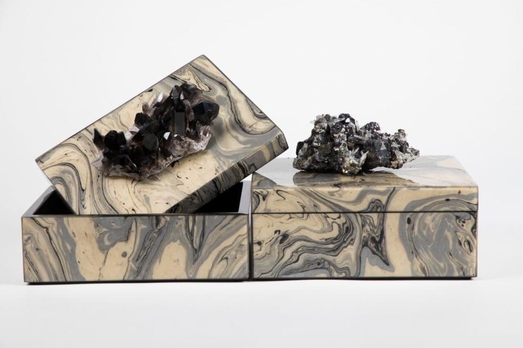 ROX Gallery's unique acrylic lacquered boxes are topped with stunning stones. 