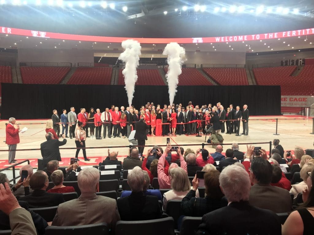 It seemed like Tilman Fertitta wanted to bring the entire crowd onto the court with him. (Photo by Chris Baldwin.)