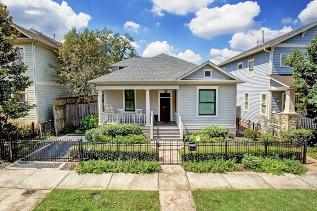 Wooden porches, windows and doors share the original charm of 919 Oxford. 