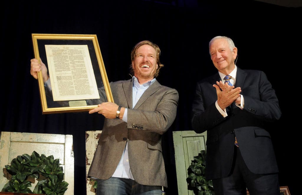 Dr. Robert Sloan presents Chip Gaines with a page from an old Bible at the HBU Spirit of Excellence Gala at The Post Oak Hotel Thursday Nov. 1,2018. (Dave Rossman photo)