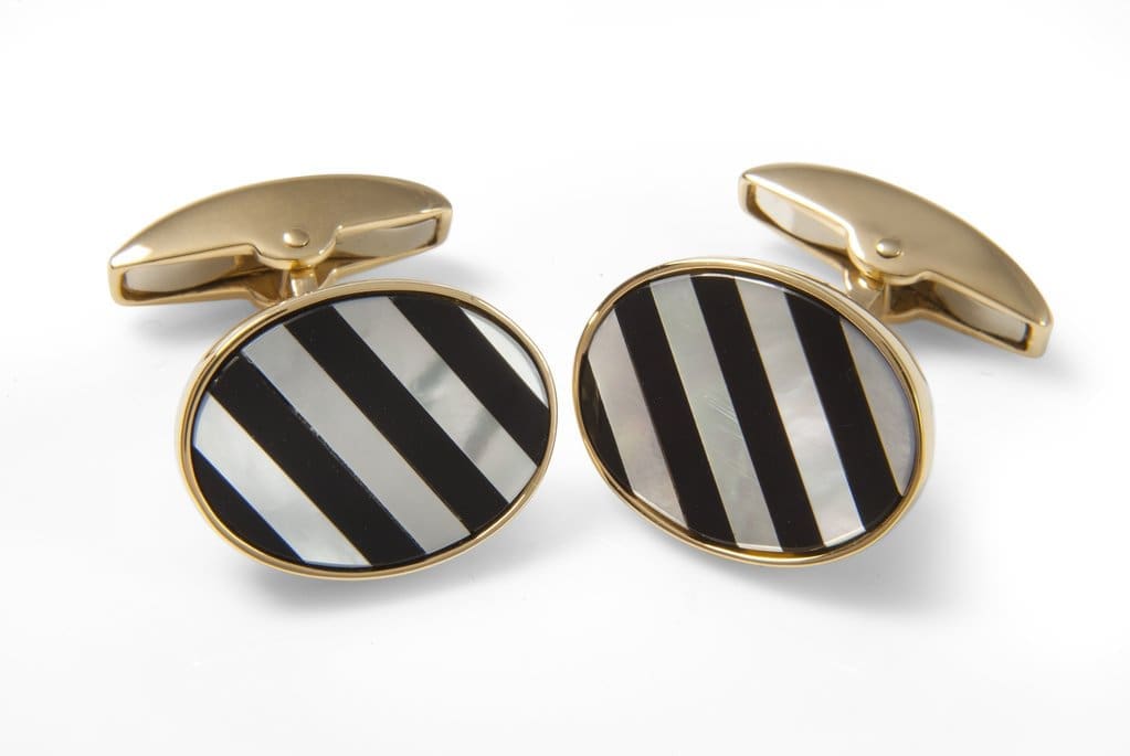 Deakin & Francis Yellow gold cufflinks with striped mother-of-pearl and onyx gemstones, $5,075