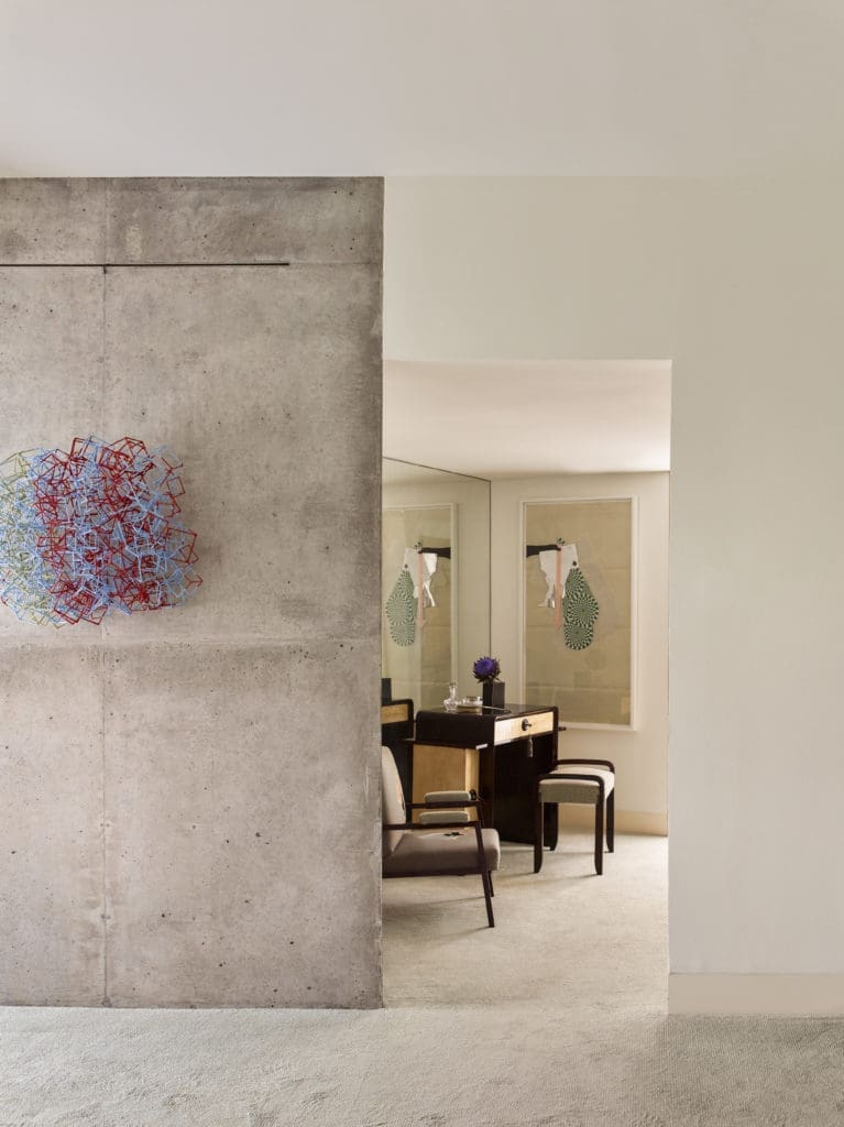 Emily Summers collaborated on a Dallas house designed by architect Antoine Predock. The concrete wall outside the guest bedroom includes a 2000 construction by artist Liz Larner.  (Photo by Nikolas Koenig)