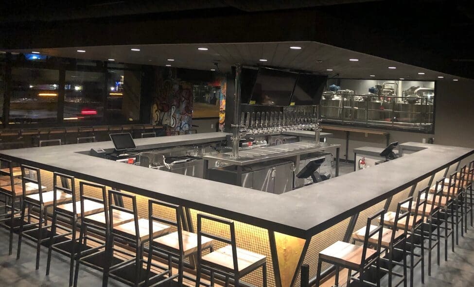 A massive 32-tap 30-seat island bar greets you when you first walk into Deep Ellum Funkytown Fermatorium.