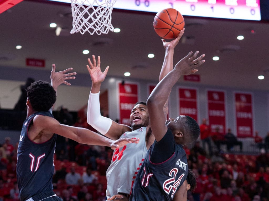 Breaon Brady fights for the University of Houston inside. (Photo by F. Carter Smith.)