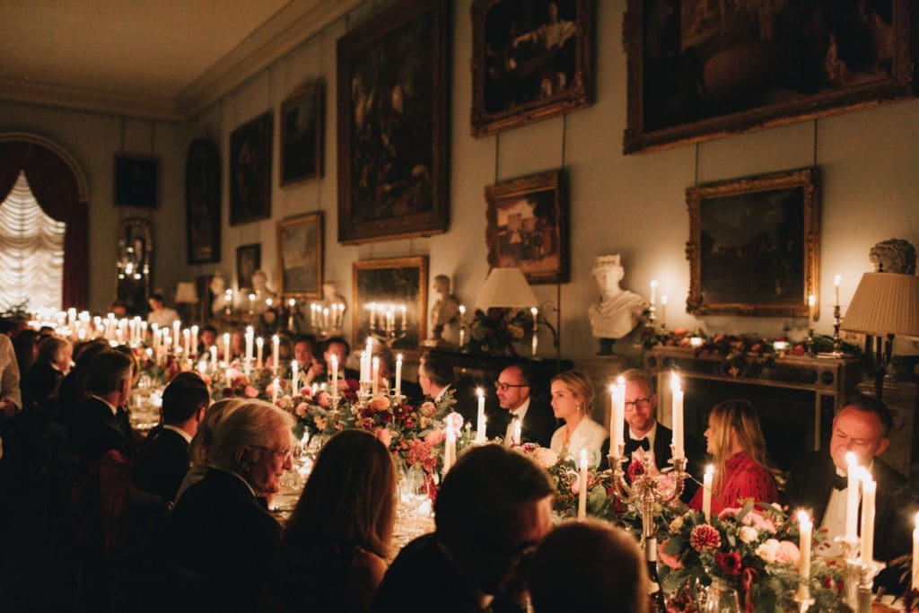 The glamorous dinner at England's Houghton Hall was attended by Dallas interior designer Joseph Minton, pictured center front. The dinner was co-hosted by Claud Cecil Gurney, founder of de Gournay. (Photo by Tori Hancock)