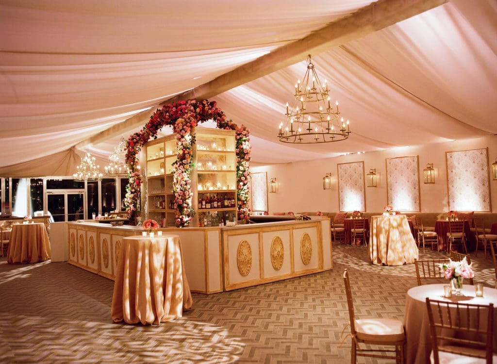 A view from the stunning reception tent with custom herringbone wood floors (Photo by Liz Banfield)