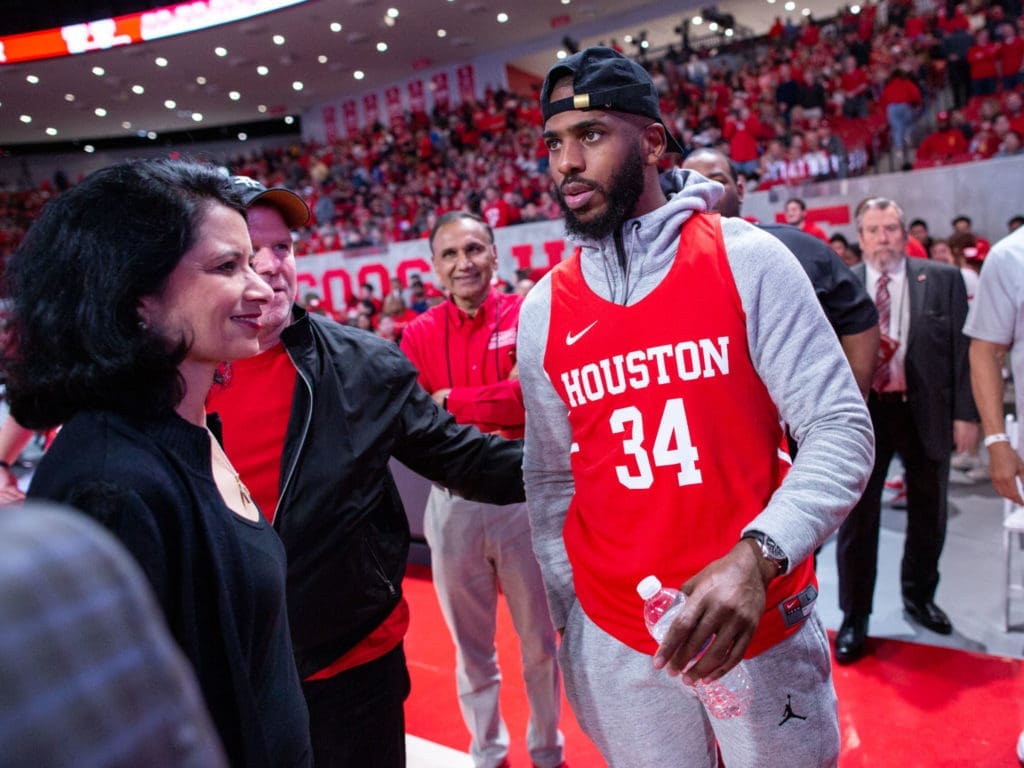 Chris Paul showed some love for the University of Houston, attending a win over Cincinnati and wearing a No. 34 Coogs jersey. (Photo by F. Carter Smith.)
