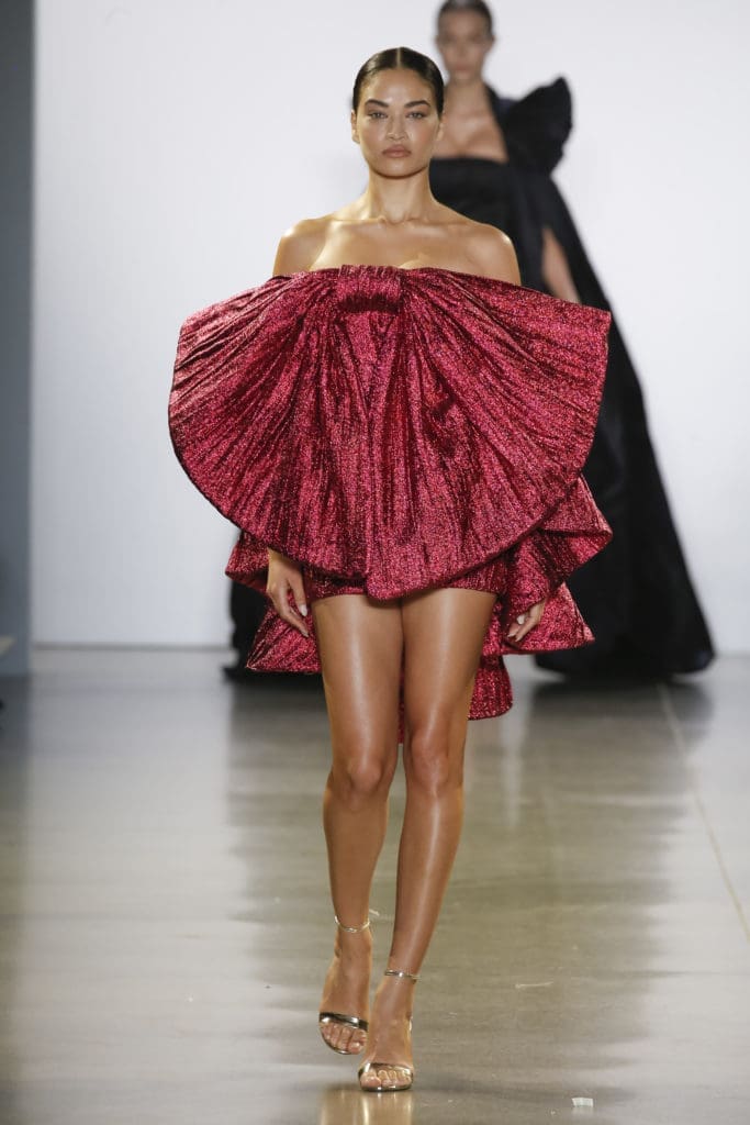 Victoria's Secret model Shanina Shaik comes down the runway in a revealing bow-shaped dress. (Photo by Cong Tri)