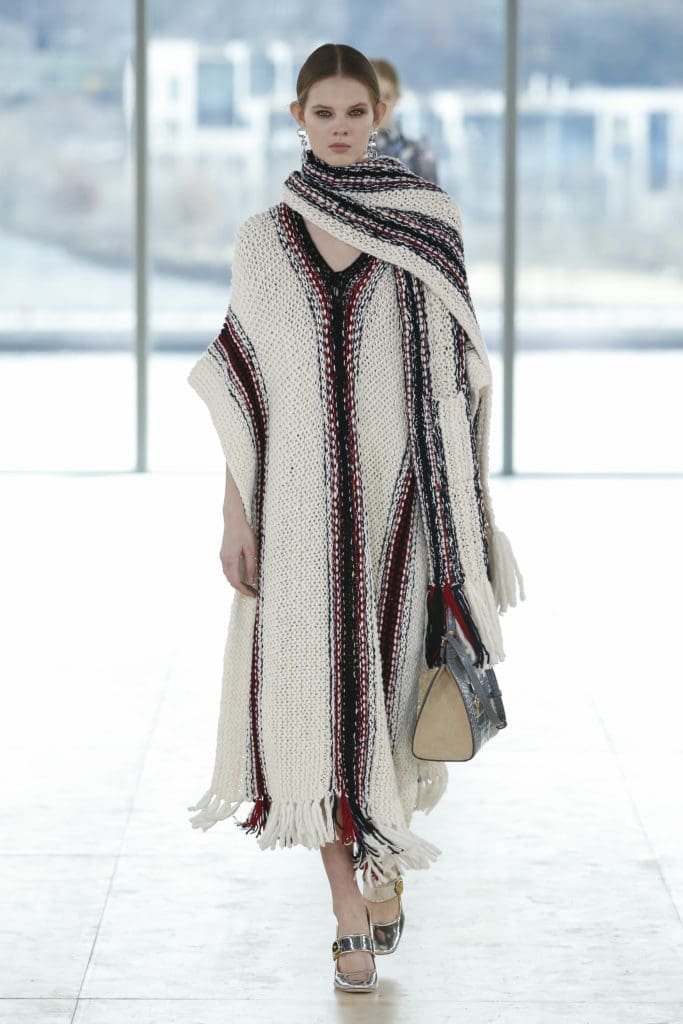 Tory Burch merino wool and cotton poncho, stripe-print crepe de chine skirt (Photo by Tory Burch)