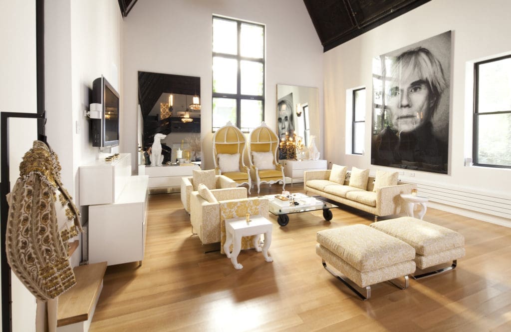 Following incarnations as a convent, a rehab center and a college club, the building was converted to condos. The Andy Warhol portrait is by Alex Geofeng Cao. (Photo by Julie Soefer)