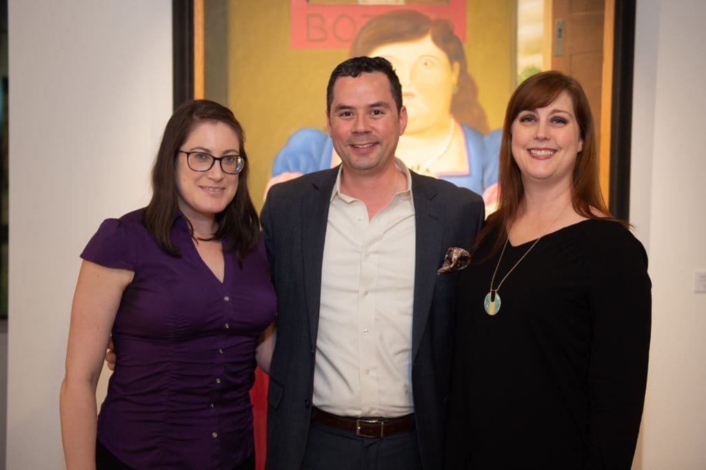 Jenny Stearns, Claudio Gutierrez and Michelle Stair at the Houston Symphony Young Associates Council party at Art of the World Gallery (Photo by Wilson Parish)