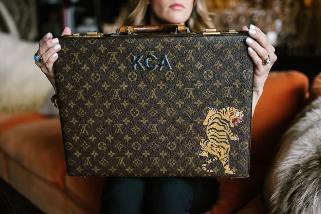 One of Kris Ammon's designs. In this case — literally a briefcase —  you can find a tempestuous tiger.