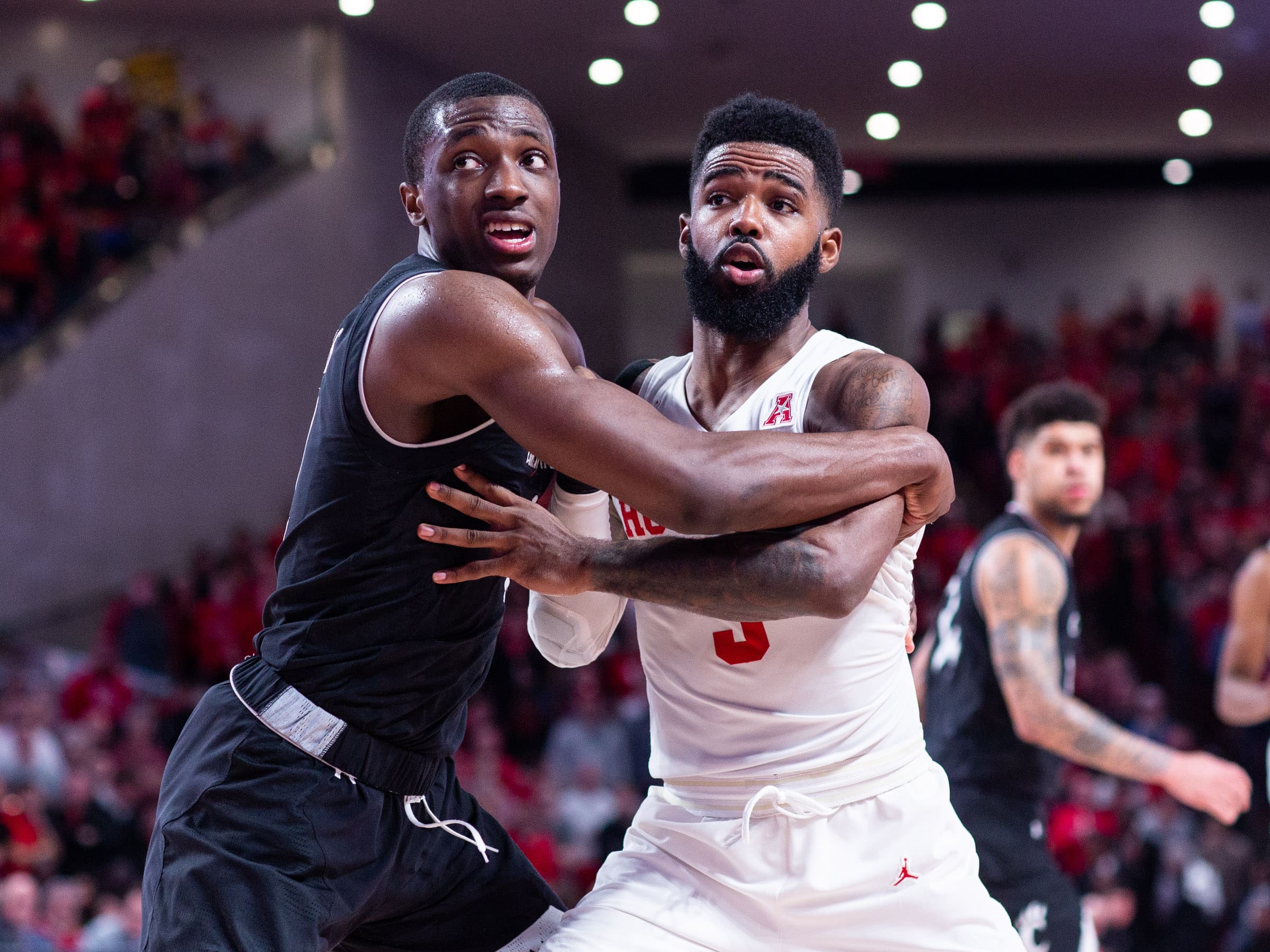 University of Houston and guard Corey Davis Jr. never shy away from the battle. 