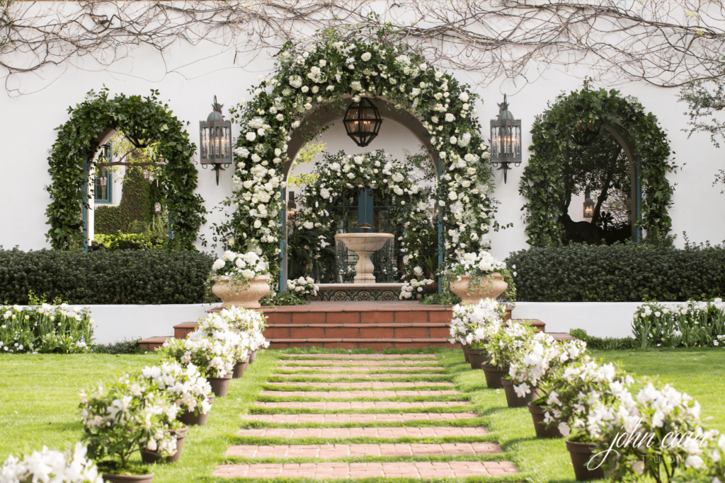 The brides's childhood home is a gorgeous, sprawling Spanish Colonial.  (Photo by John Cain Photography)