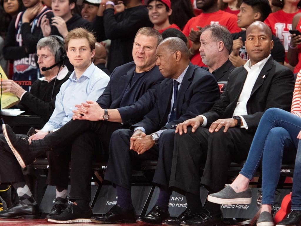 Patrick Fertitta, Tilman Fertitta and Houston Mayor Sylvester Turner enjoy a University of Houston basketball win. (Photo by F. Carter Smith)