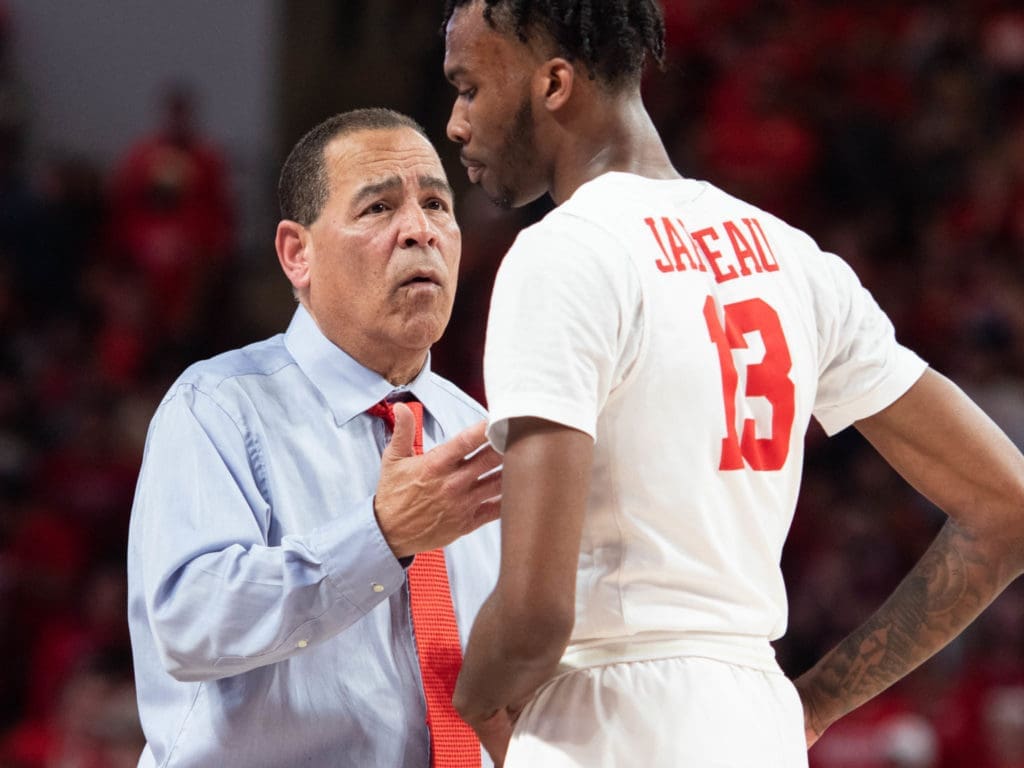University of Houston coach Kelvin Sampson is always teaching no matter how big the moment. Here, he tells DeJon Jarreau what he doesn't want to hear. (Photo by F. Carter Smith)