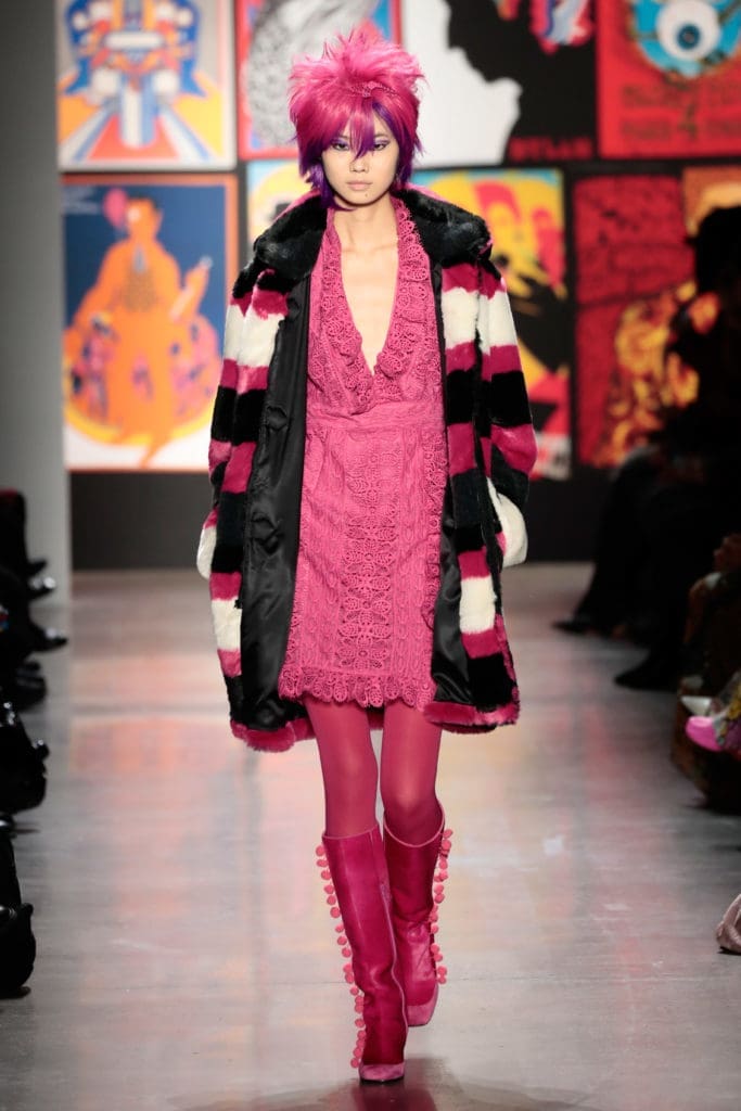 Anna Sui V-neck dress, striped coat, and boots laced with pom-pons. (Photo by Anna Sui)