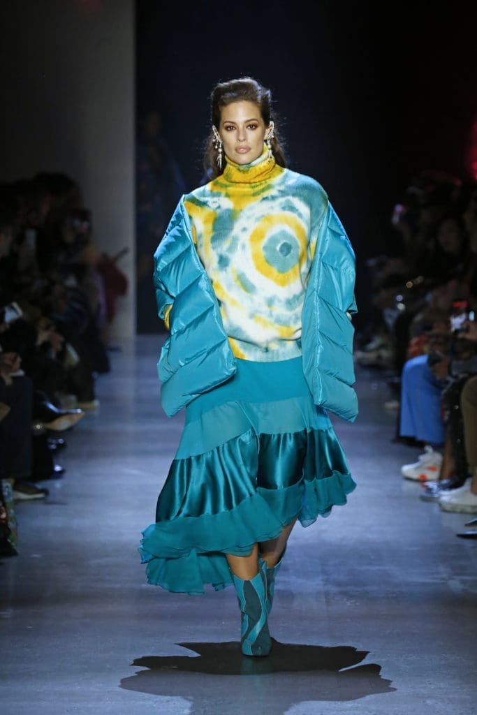 Prabal Gurung turquoise nylon down-filled puffer stole, tie-dye cashmere knit turtleneck, bias-cut skirt with silk chiffon inserts and cascade ruffle hem. (Photo by Prabal Gurung)
