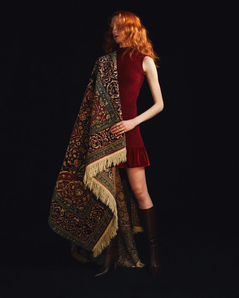 Amir Taghi chose colors from a Persian rug in his family's Houston home for the fall collection, which including this dress in a deep burgundy shade. (Photo by Amir Taghi)