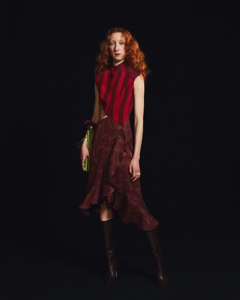 Amir Taghi striped vest blouse and embroidered skirt with ruffle detail at hemline. (Photo by Amir Taghi)