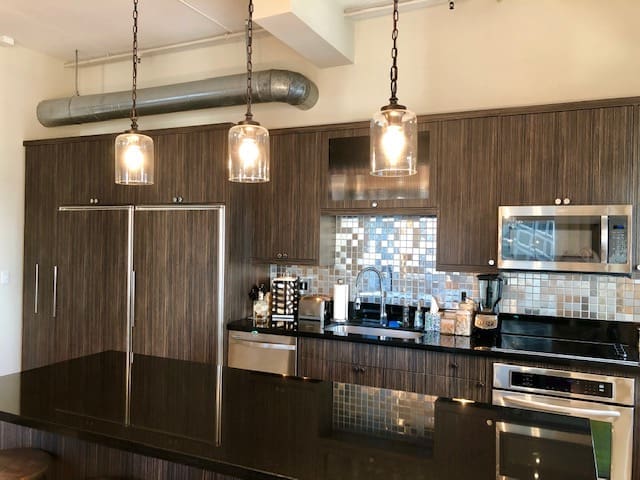 The St. Germain loft kitchen is a modern beauty. (Photo by Jackie Traywick)