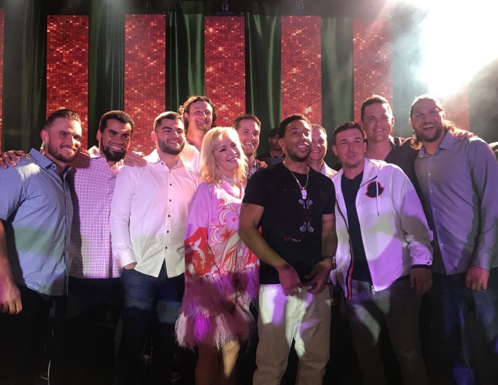 Whitney Crane and Ludacris on stage at her birthday party in Palm Beach, Florida. (Photo by Oona Beyer, Dragonfly Photography)