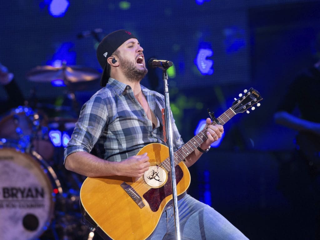 Luke Bryan Shamelessly Flirts, Accuses Crowd of Stripping Him Down — and Don’t Forget That Growl