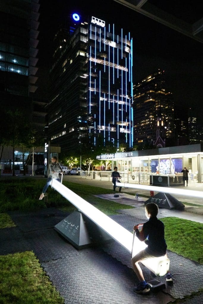 Seesaws are activated by public play with lights and sound. Nighttime is a great time to experience the installation. Courtesy of DAD
