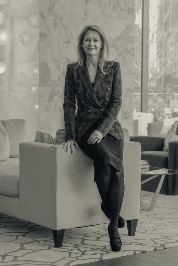 Lynn McBee photographed at her new high-rise apartment.  (Photo by Misael Rodriquez)
