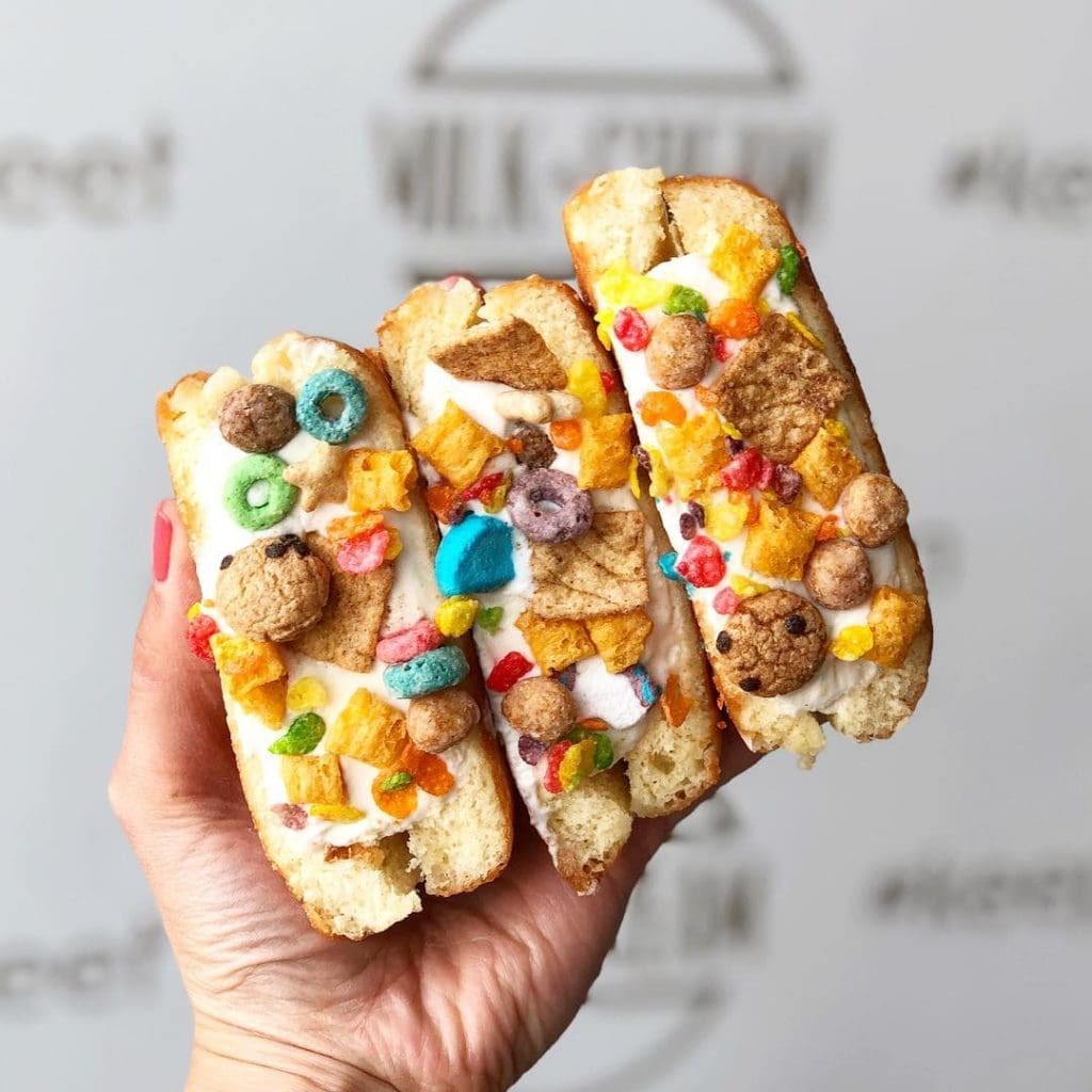 Milk & Cream tops their ice cream filled glazed donuts with cereal. Courtesy of Milk & Cream