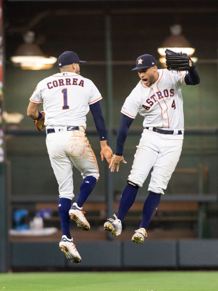 Carlos Correa and George Springer know it's good to be Houston Astros. (Photo by F. Carter Smith)