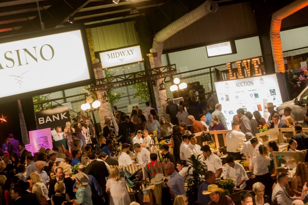 The crowd scene at the Houston Cattle Baron's Ball at the George Ranch. (Photo by Mike Charlton)
