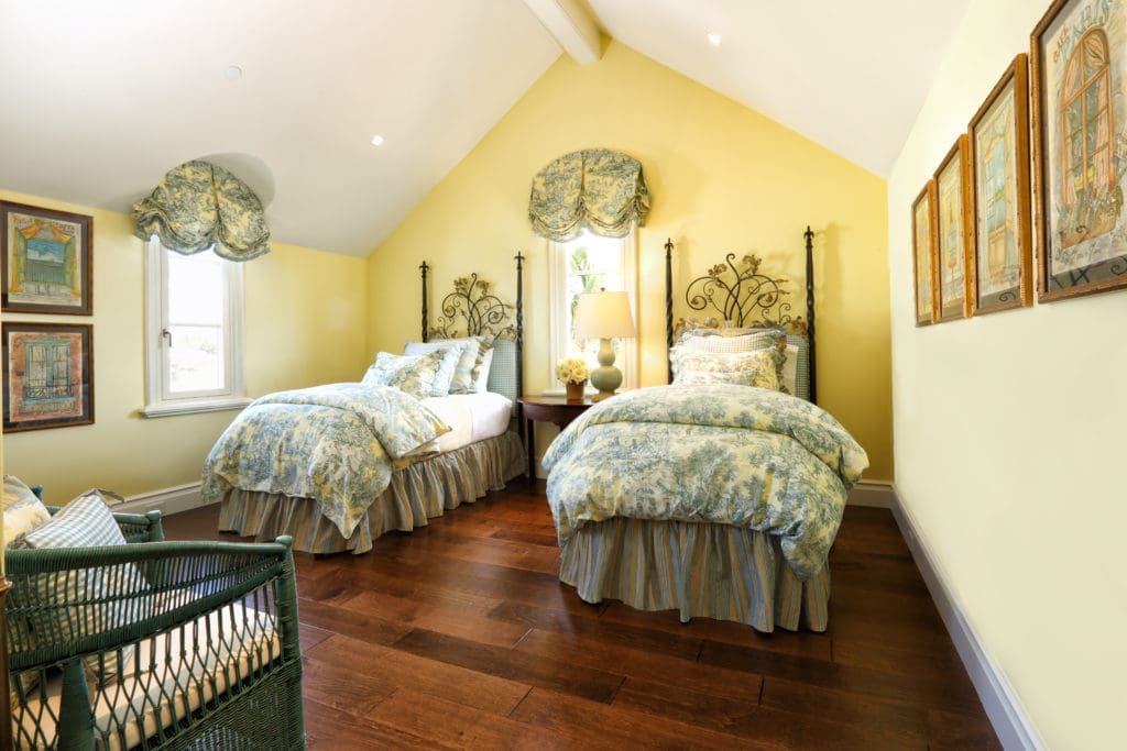 The yellow bedroom at the Corona del Mar home designed by Bill Stubbs for a couple from San Antonio.
