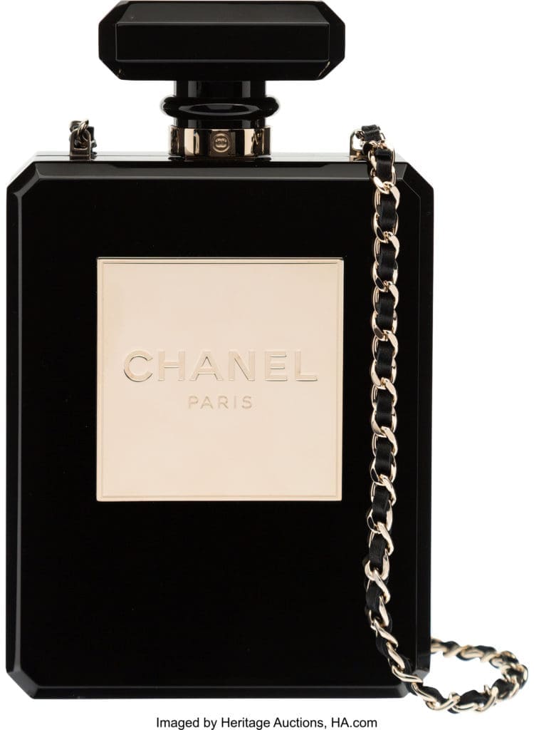 From Candy Spelling's collection, a Chanel runway classic, which the producer admired but has never worn: Chanel Limited Edition Black Plexiglass Perfume Bottle Bag (Courtesy Heritage Auctions, HA.com)