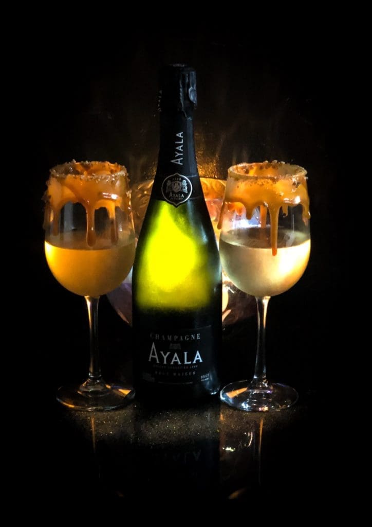 The French Kiss drink is Champagne covered in caramel and bruleed sugar.