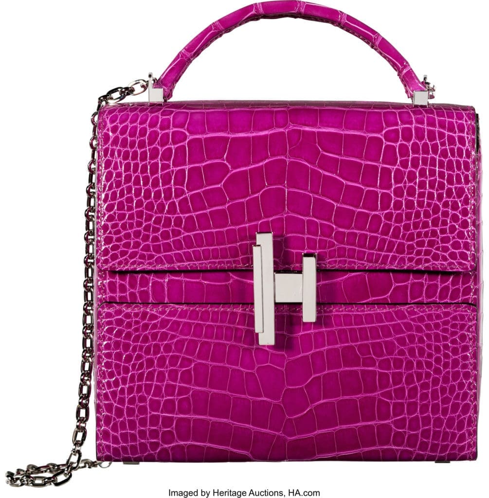 One of Candy Spelling's favorites, this lot graces the cover of the April 28 Auction catalogue: Hermès Shiny Rose Scheherazade Alligator Cinhetic d'Hermès Bag with Palladium Hardware. Spelling acquired the striking handbag on an impulse buy from the Hermès boutique in Las Vegas after winning big in the casinos. (Courtesy Heritage Auctions, HA.com)  
