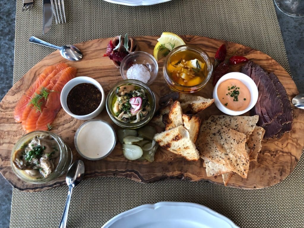 The 1751 Sea and Bar Charcuterie Board features a rare selection of smoked seafood. (Photo by Shelby Hodge)
