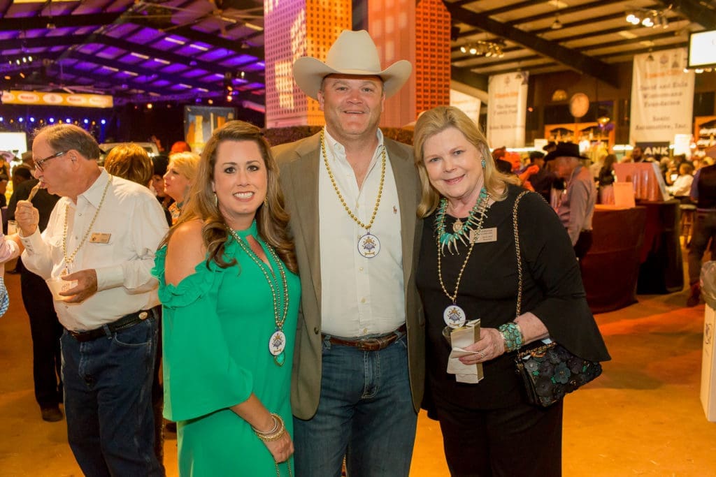 Jennie Adamson, Roger Adamson, Judi Johnson at the Houston Cattle Baron's Ball at the George Ranch.  (Photo by Mike Charlton)
