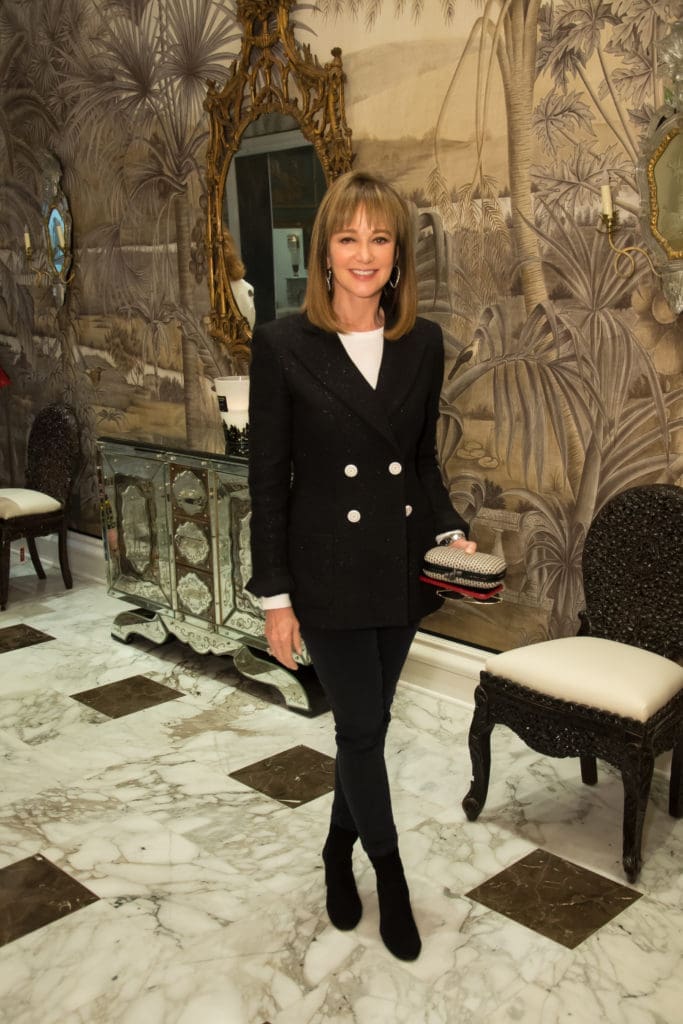 Janet Gurwitch in her uniform blazer, white shirt and jeans at a luncheon at Moxie in April. (Photo by Emile C. Browne)