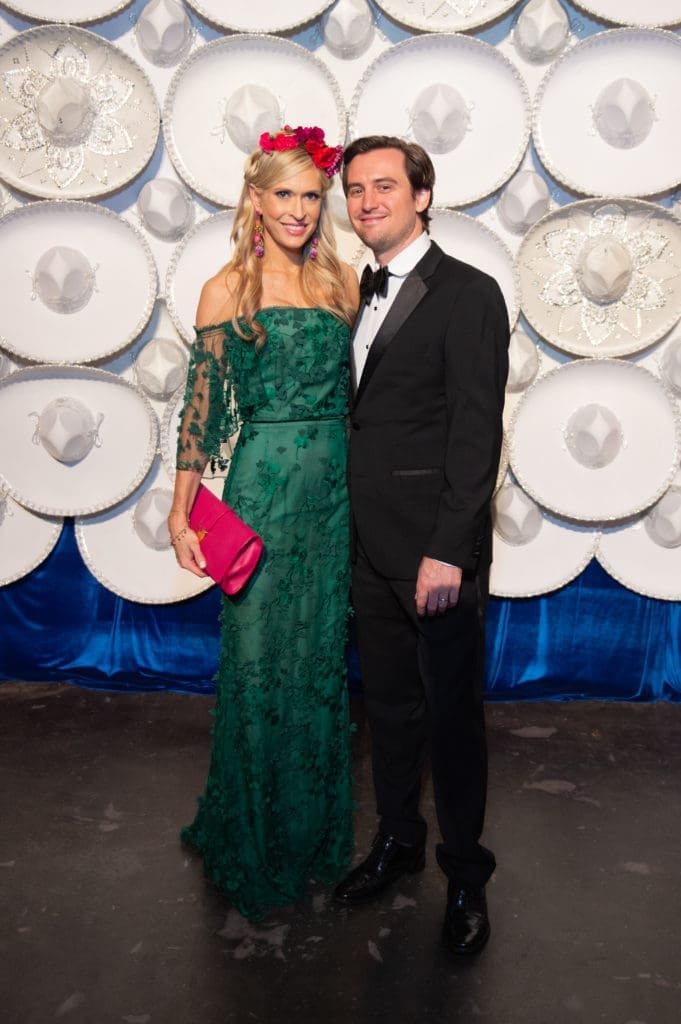 Kendall Hanno, left, chose a green Marchesa gown and wore fresh flowers in her hair for the Houston Grand Opera Ball. (Photo by Priscilla Dickson)