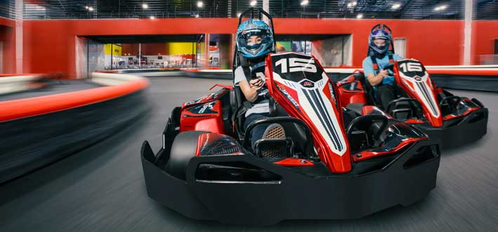 Arrive and drive at K1 Speed indoor electric go-kart racing. 
