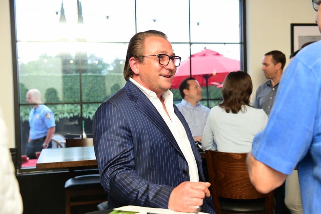 Benjamin Berg, photographed at the opening of B.B. Italia Kitchen & Bar, is raising funds for is 400 employees. (Photo by Daniel Ortiz)