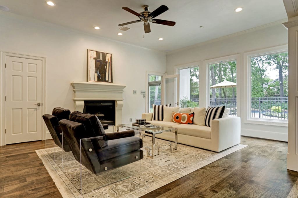 The family room of the 7,800 square foot home at 12014 Tall Oaks on view at the John Daugherty Realtors Spring Soirée.(Photo by TK Images)