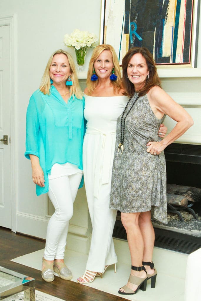 Rhonda Brown, Vanessa Sendukas, Angela Povjol at the John Daugherty Realtors Spring Soirée open house at 12014 Tall Oaks. (Photo by Chris Bachman)