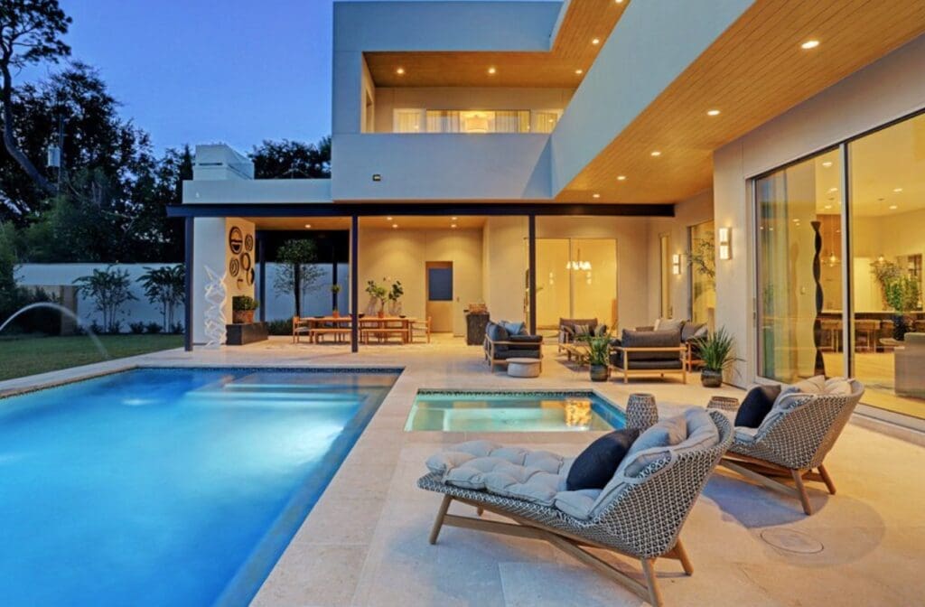 Another contemporary home by builder Allan Edwards where the pool is incorporated into an indoor/outdoor living scheme.