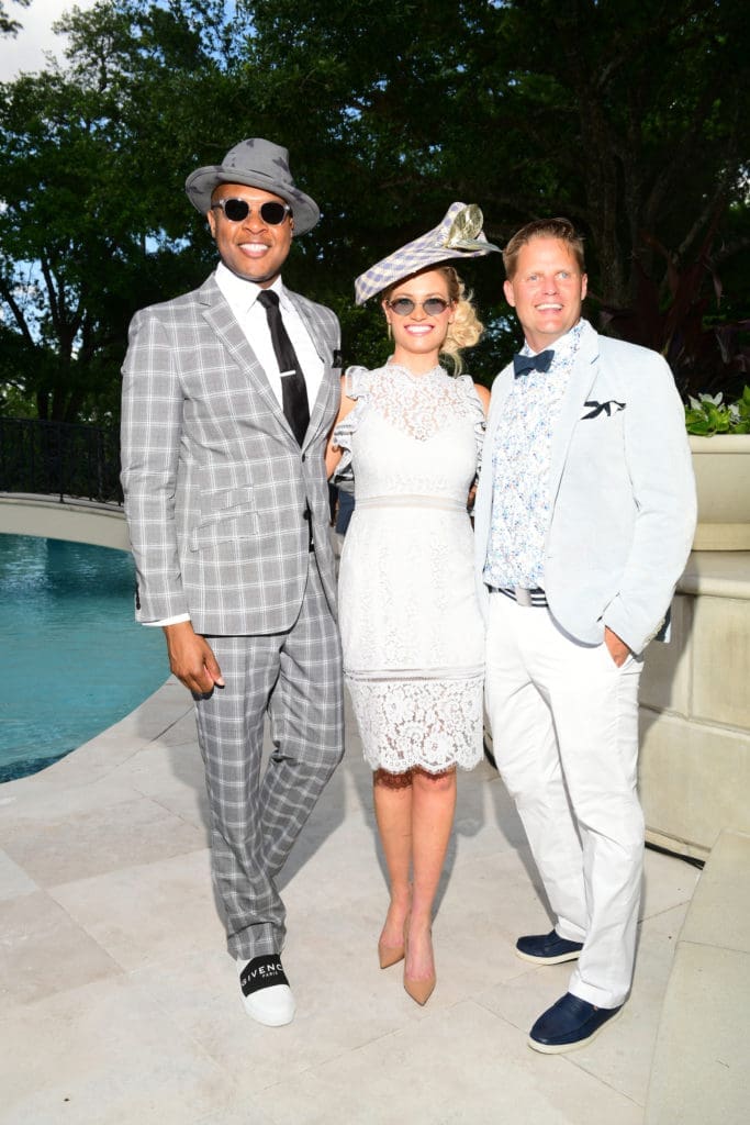 Travis Torrence, Lauren Varnado, Heath Lapray at the Hats, Hearts & Horseshoes Kentucky Derby Affair at the Fertitta home benefiting Bo's Place. (Photo by Daniel Ortiz)