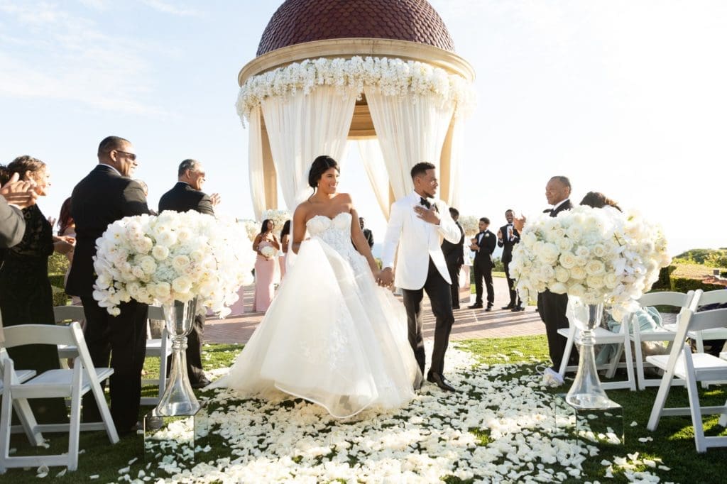 Kirsten Katrina Corley and Chancelor Jonathan Bennett, aka Chance the Rapper, wed at The Resort at Pelican Hill in Newport Beach in 2019. (Photo by Duke Images)