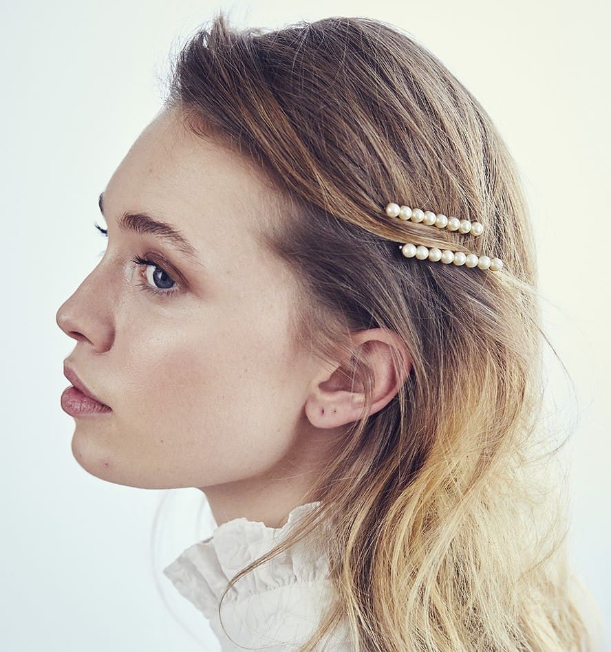 Go ahead and layer up the bobby pins this summer for a cool, more-is-more look.