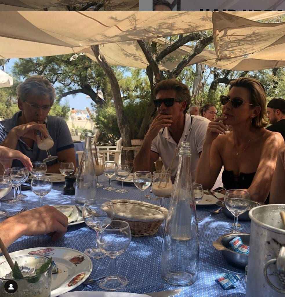 If only you could see what Dominique Sachse & Nick Florescu see at the wicked beachfront Le Club 55, perhaps the scantily clad girl in the giant champagne coup. (Photo by Instagram photos)