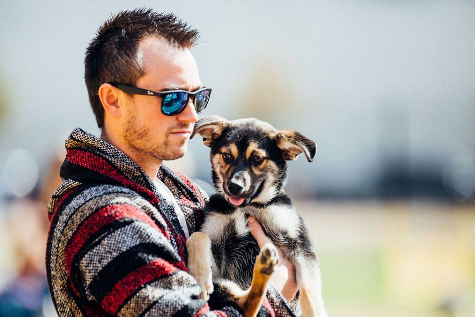 Who can resist a guy who loves his pup, especially at Mutts Canine Cantina? 
